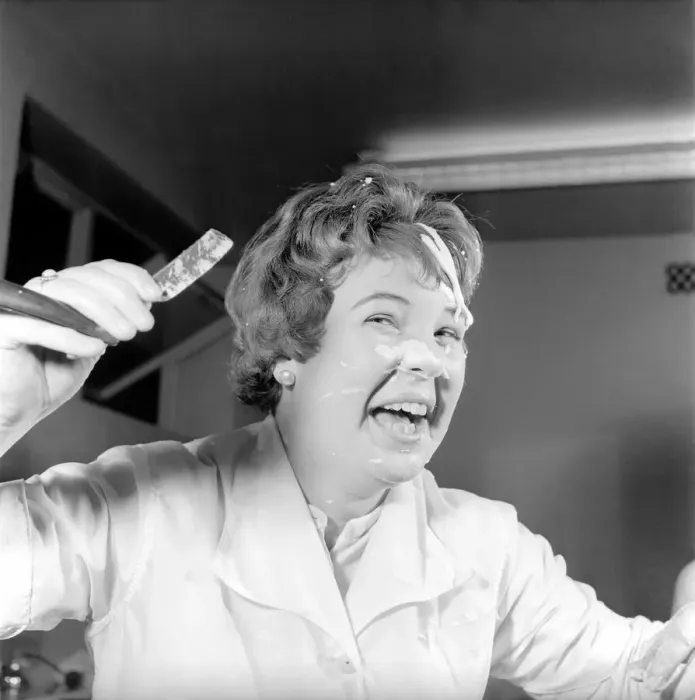 Framed Print : Women barbers training with cut throat razors, learn how to shave by using balloons Framed Print : Women barbers training with cut throat razors, learn how to shave by using balloons