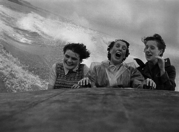 Three women were bounced and soaked as each big wave drenched them whilst on a high speed
