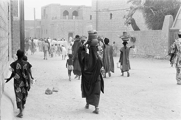 Women carrying pots to market in Timbuktu 23rd May 1976