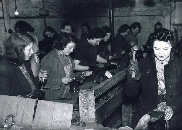 Women Cobblers at work manufacturing boots for the army during the Second World War