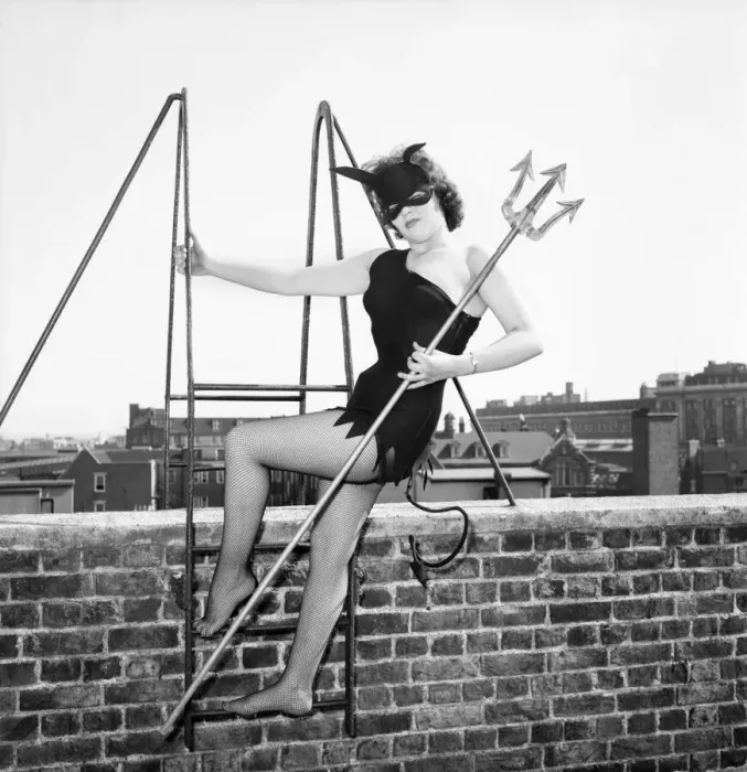 Framed Print : Women dressed as She Devil. Model: Pamela Dennis. May 1957 E270-003