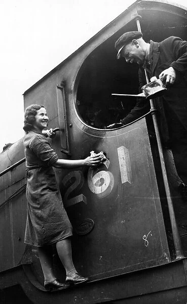 Women engine cleaners at work during World War II. Circa 1941