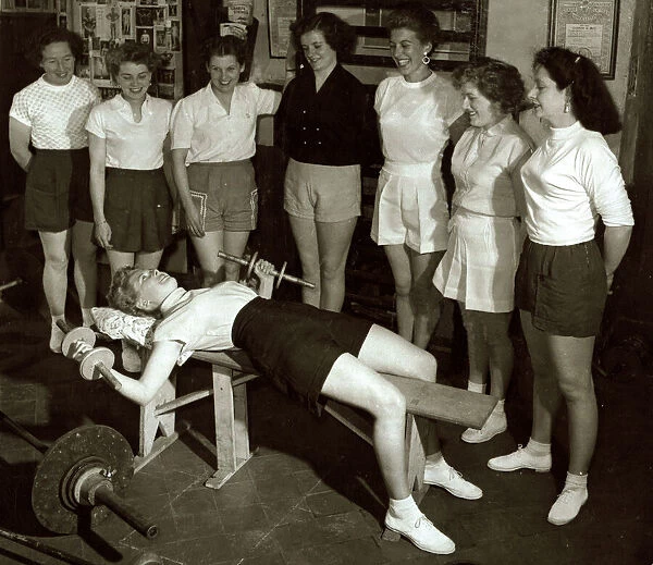 Women Exercising - July 1954 Stretching weight lifting