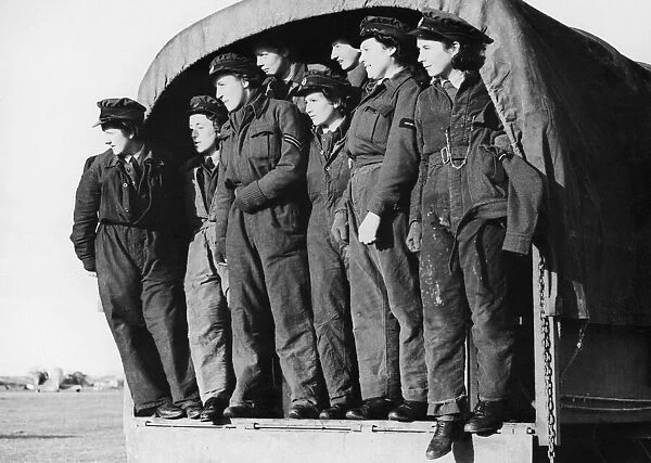 Women flight mechanics are working for the R. A. F. in Flying training Command