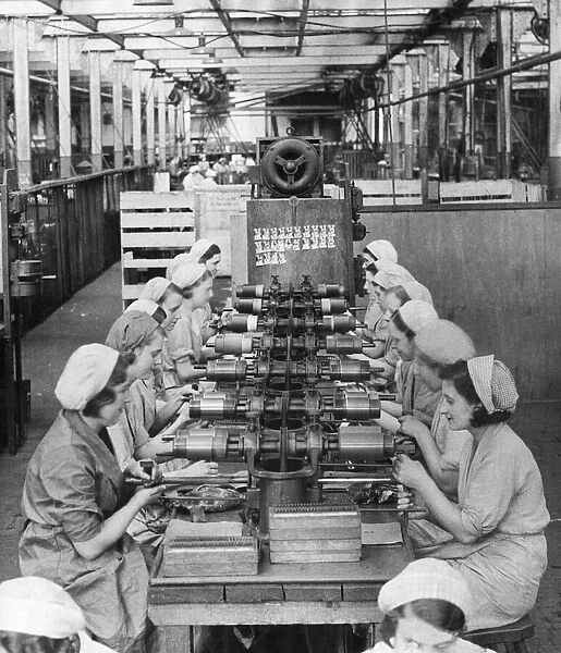 Women labourers working in the Darwins Ltd, (steel) Magnet and Razor Blades Factory