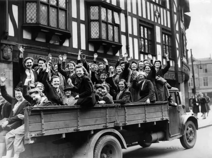 Framed Print : Women munition workers waving cheerfully as they move away to their factory on an army Framed Print : Women munition workers waving cheerfully as they move away to their factory on an army