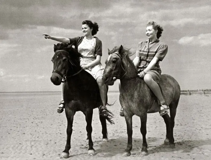 Framed Print : Two women out riding their horses on the beach at Hunstanton in Norfolk at the start of Framed Print : Two women out riding their horses on the beach at Hunstanton in Norfolk at the start of
