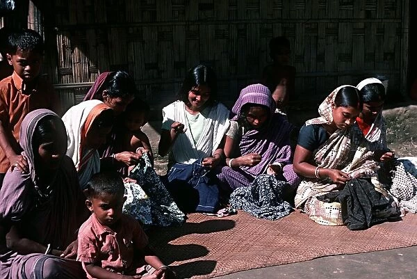 Women sewing in village of Kadatali near Rangunia South East Bangladesh
