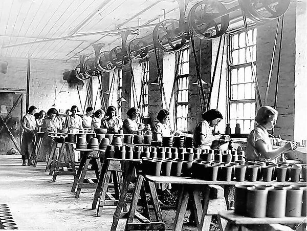 Women shaping the pottery in Malings pottery works