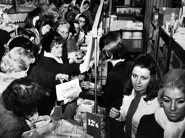 Women shopping for bargains in the sales after christmas. Liverpool, 31st December 1969