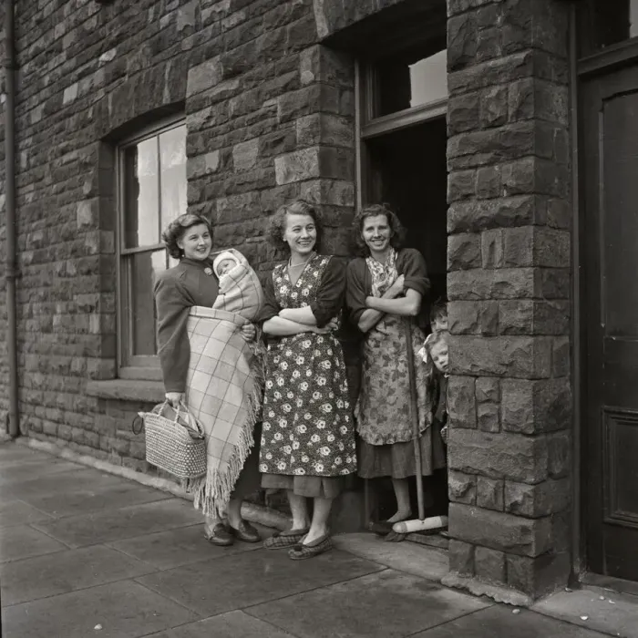 Framed Print : Three women standing gossiping on the street outside terraced housing in Cardiff, Wales Framed Print : Three women standing gossiping on the street outside terraced housing in Cardiff, Wales
