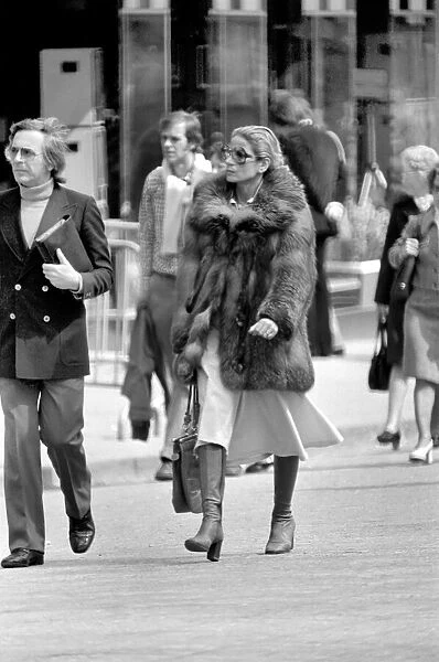Women walking through the streets of Paris, France. April 1975 75-2099-014