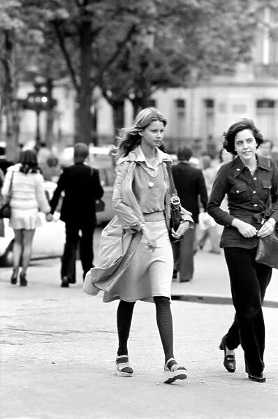 Women walking through the streets of Paris, France. April 1975 75-2099-012