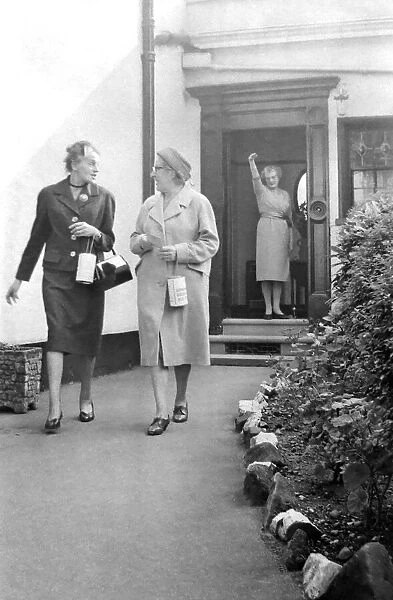 Two women get waved off by the householder after a successful visit