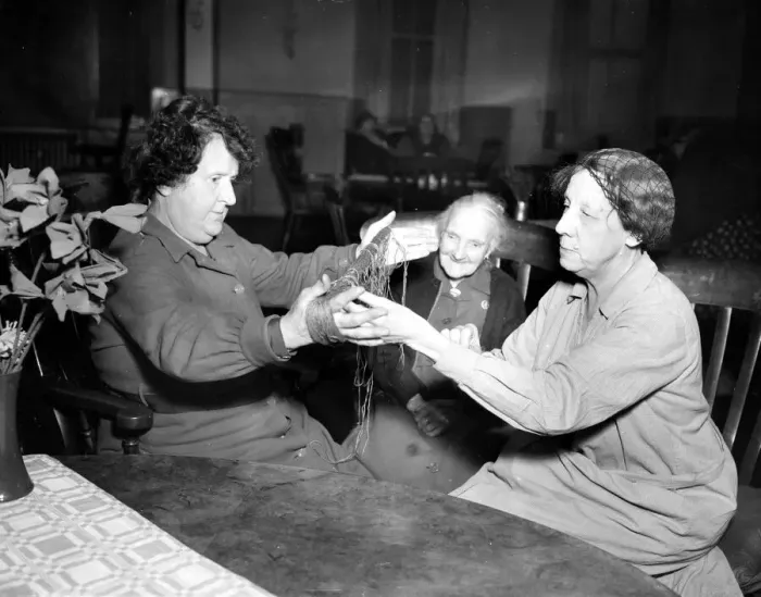 Framed Print : Women winding wool in preparation to knitting at a south coast nursing home. Circa 1953