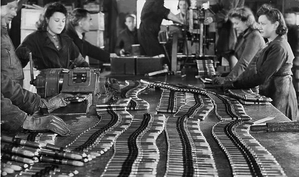 Women at work at a munitions factory during the Second World War. Circa 1941