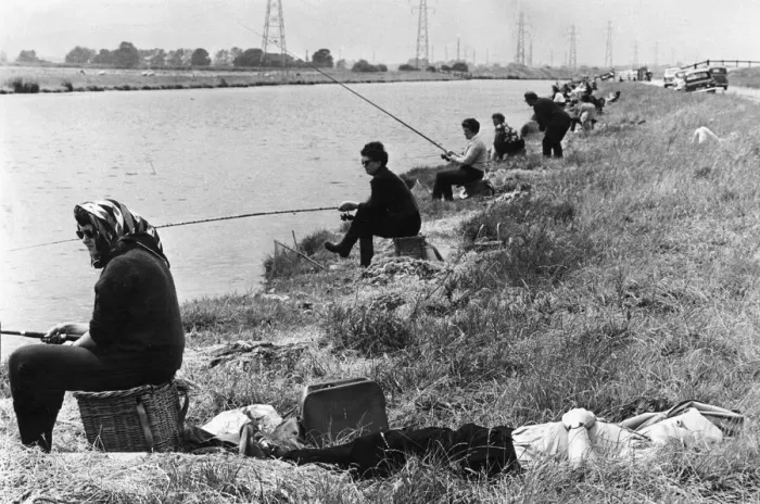 Framed Print : Womens angling competiton July 1966 Her husband catches up on 40 winks as his Framed Print : Womens angling competiton July 1966 Her husband catches up on 40 winks as his