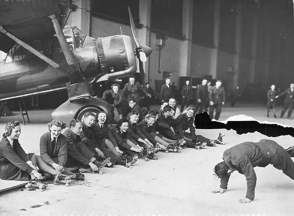 The Womens Auxiliary Air Force (WaF) - enjoying rollerskating in an aircraft hanger