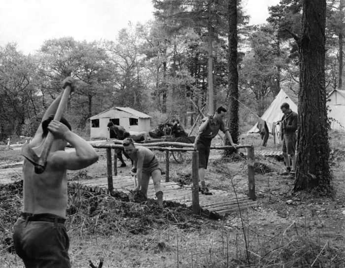Framed Print : Woodland camp Voulenteers building a bridge around the camp. May 1933 P000023