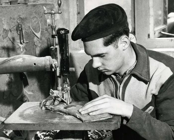Framed Print : A worker concentarting at his table at a Horn making factory April 1953 Framed Print : A worker concentarting at his table at a Horn making factory April 1953