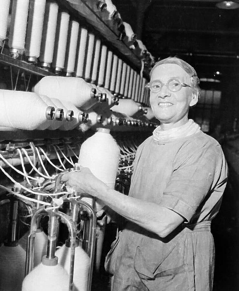 Worker at Regent Cotton Mill owned by the Lancashire Cotton Corporation Limited