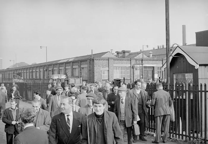 Framed Print : Workers leave Longbridge motor plant in Birmingham after a car delivery on the last day Framed Print : Workers leave Longbridge motor plant in Birmingham after a car delivery on the last day