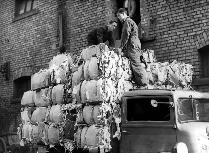 Framed Print : Workers load a lorry with 50 bales of salvaged paper weighing three tons at Newcastle Framed Print : Workers load a lorry with 50 bales of salvaged paper weighing three tons at Newcastle