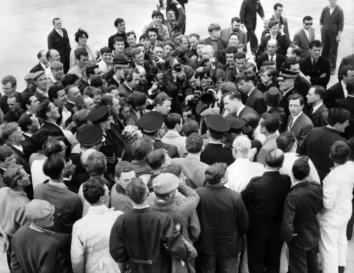 Framed Print : Workers, press men and officials try to get a look at the New Flyweight Champion of Framed Print : Workers, press men and officials try to get a look at the New Flyweight Champion of