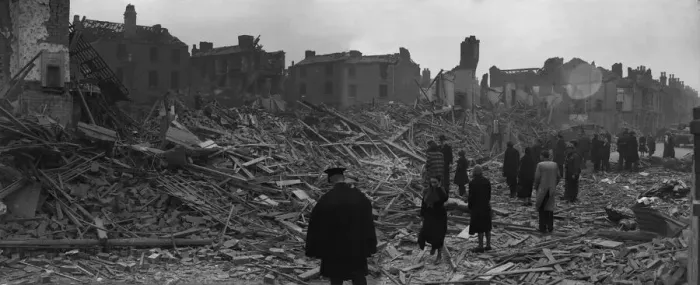Framed Print : Workers and residents make their way through the shattered remains of Queens Road, Aston Framed Print : Workers and residents make their way through the shattered remains of Queens Road, Aston