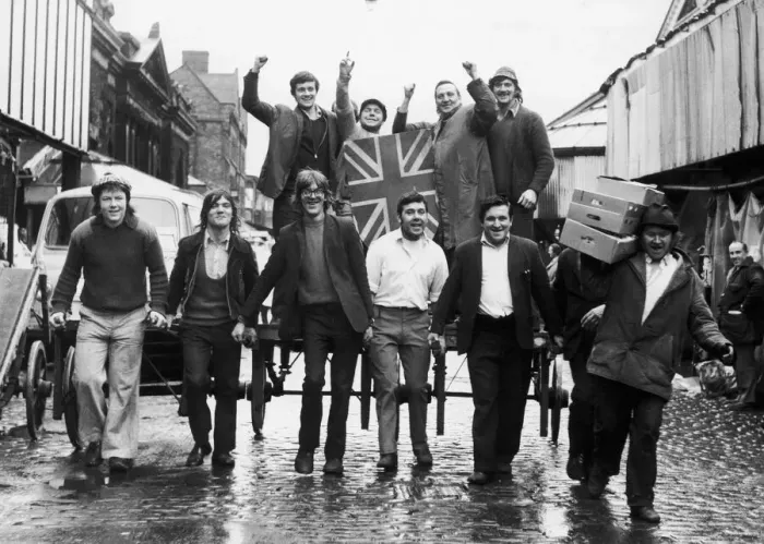 Framed Print : Workers at the Smithfield Market parade a Spud Sack Jack - the Union Jack was last used