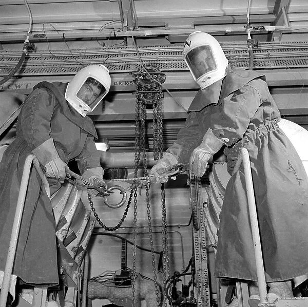 Workers wearing protective clothing at Dounreay Atomic Reactor near Thurso