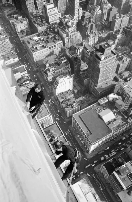 Framed Print : Workmen busy cleaning windows 1000 ft up the Empire State building in Manhatten New York Framed Print : Workmen busy cleaning windows 1000 ft up the Empire State building in Manhatten New York