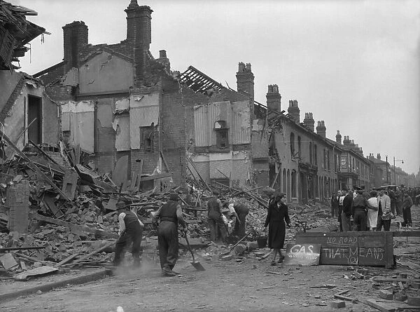 Workmen clearing the rubble in Highgate Road, Balsall Heath