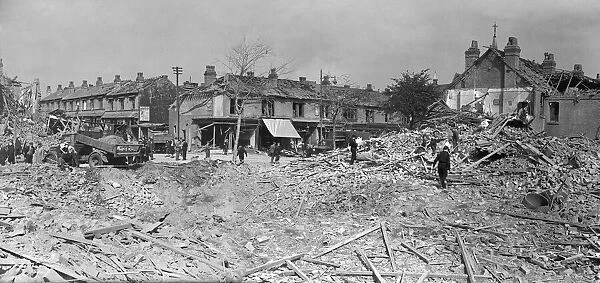 Workmen clearing the rubble at Rookery Road, Handsworth