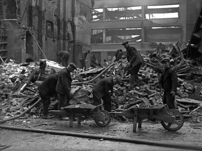 Framed Print : Workmen clearing up and sifting through the remains of the Corn Exchange, Carrs Lane