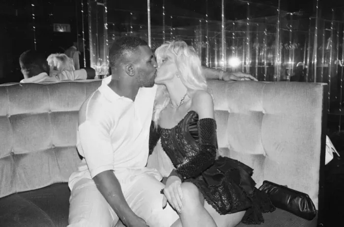 Framed Print : World Champion boxer Mike Tyson boogies the night away at Jacqueline