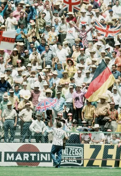 Framed Print : World Cup 1970 fans supporters waving flags Union Jack umbrella England West Germany