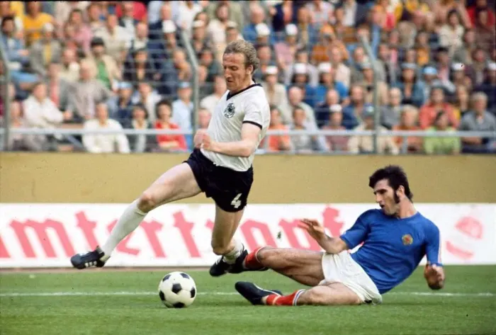 Framed Print : World Cup 1974 W. Germany v Yugoslavia Schwarzenbeck rides a
