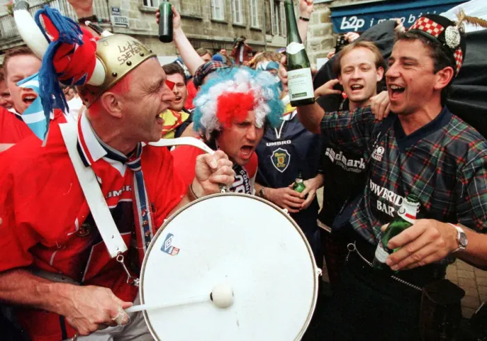 Framed Print : World Cup France 1998. Tartan army football fans make their way to the stadium in Framed Print : World Cup France 1998. Tartan army football fans make their way to the stadium in
