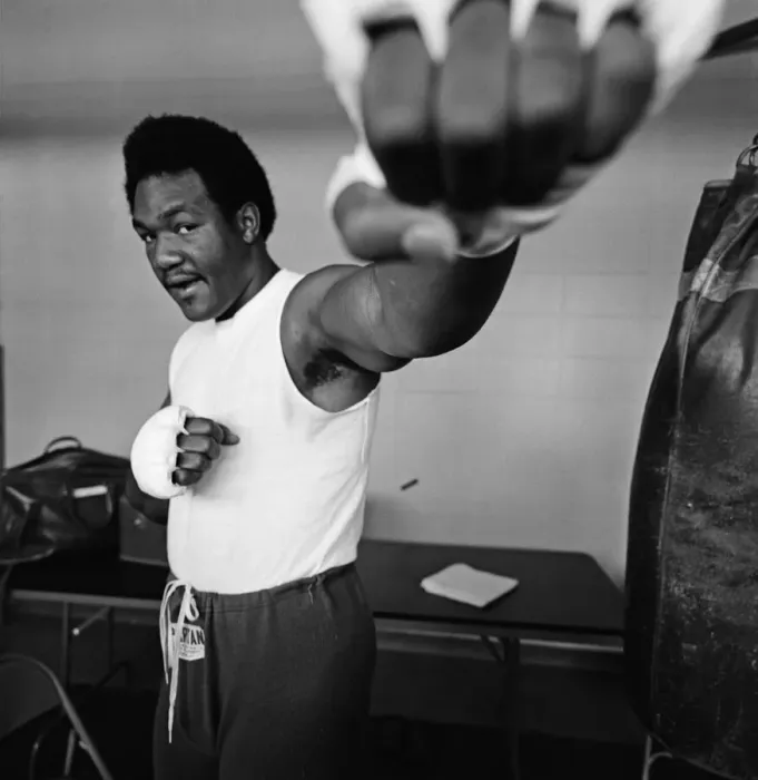 Framed Print : World heavyweight champion George Foreman during a training session at Hayward Boys Club