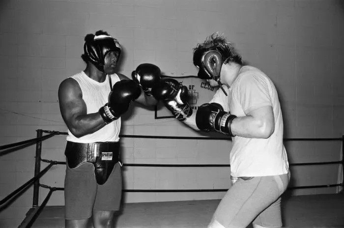 Framed Print : World heavyweight champion George Foreman during a training session at Hayward Boys Club Framed Print : World heavyweight champion George Foreman during a training session at Hayward Boys Club