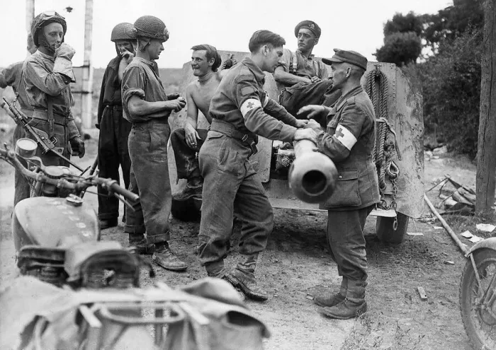 Framed Print : World War 2 August 1944 British and German Red Cross personnel meet over a howitzer
