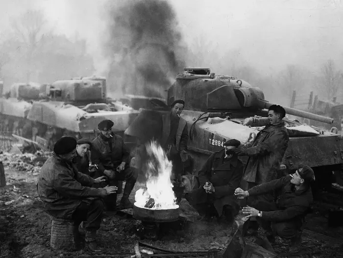Framed Print : World War 2 Belgium December 1944 Troops from a tank recovery unit relax around a Framed Print : World War 2 Belgium December 1944 Troops from a tank recovery unit relax around a