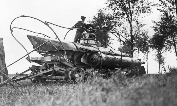 Framed Print : World War 2 September 1944 A British officer examines a captured German one-man Framed Print : World War 2 September 1944 A British officer examines a captured German one-man