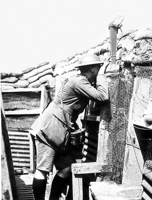 Framed Print : World War One ANZAC Australian officer watches the enemy through a periscope during Framed Print : World War One ANZAC Australian officer watches the enemy through a periscope during