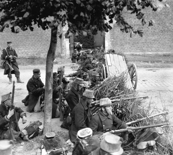 Framed Print : World War One - Belgian troops take up positions behind a barricade waiting for German Framed Print : World War One - Belgian troops take up positions behind a barricade waiting for German