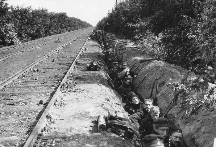 Framed Print : World War One - Belgian troops wait in a trench beside a railway line as they advance