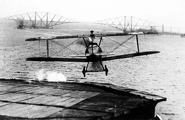 World War One A biplane takes off from the deck of the aircraft carrier HMS Argus in