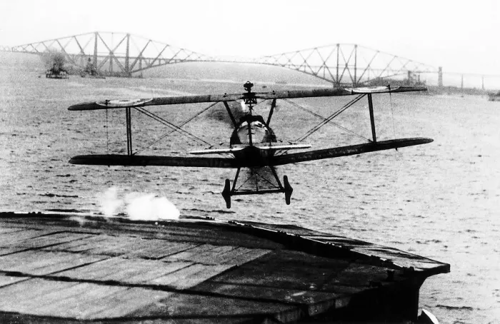 Framed Print : World War One A biplane takes off from the deck of the aircraft carrier HMS Argus in Framed Print : World War One A biplane takes off from the deck of the aircraft carrier HMS Argus in