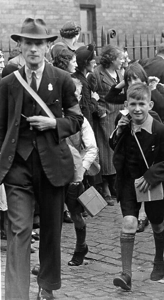World War Two - Evacuation of children A Marshall leads the way to the buses